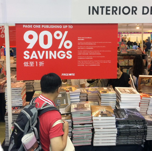 Photo of a Page One booth with a 90% off sign